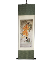 Load image into Gallery viewer, This amazing carnivorous tiger is climbing fast and furious to the top of the cliff to survey his surroundings. His long strides and spring like legs are ready to pounce, as he glances side to side in search of his next prey. This Japanese themed tiger scroll was influenced by Asian artwork.
